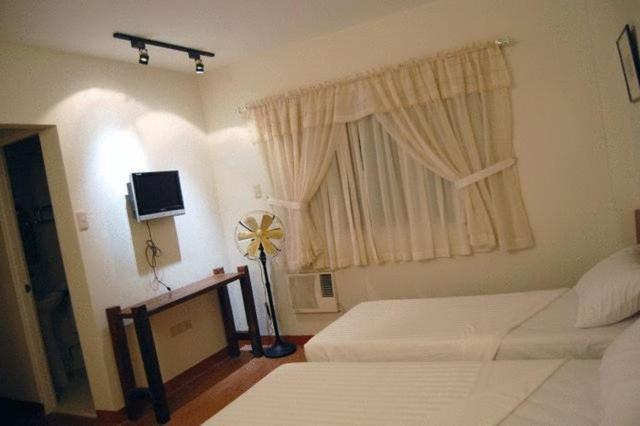 Ilocos Rosewell Hotel Ruang foto